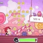 Juego de plataforma con personaje corriendo, recolectando monedas y superando obstáculos, ambientado en un mundo de dulces