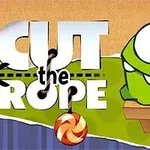 Logotipo de Cut the Rope con el personaje verde Om Nom y un caramelo colgante