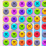 Imagen de juego de puzle con pastillas de colores y cruces marca X